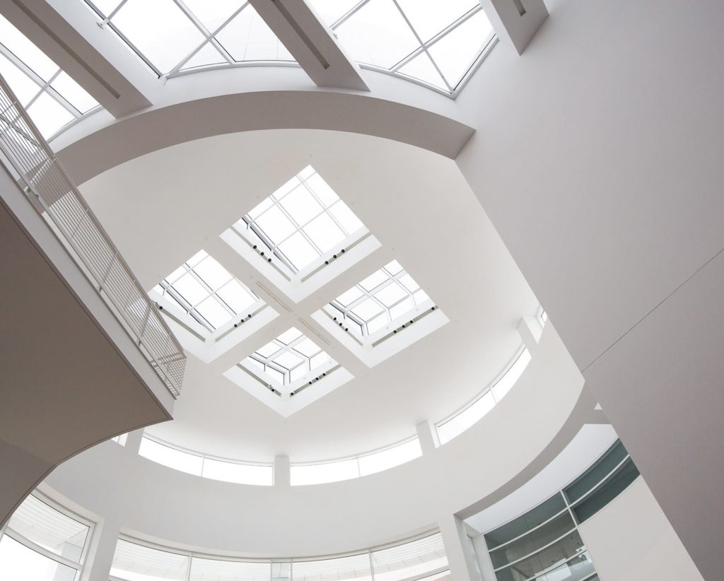 Window cleaning is a huge factor in first impressions. The atrium to a hospital with skylights.