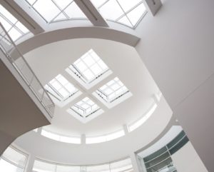 Window cleaning is a huge factor in first impressions. The atrium to a hospital with skylights.
